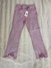 Load image into Gallery viewer, Purple jeans with a tag on a beige blanket