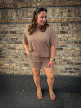 Load image into Gallery viewer, woman wearing brown set standing against brick wall
