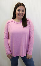 Load image into Gallery viewer, Woman wearing a pink long-sleeve top against a white background