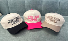Load image into Gallery viewer, Three caps with 'Jesus Saves I Spend' text on a gray surface