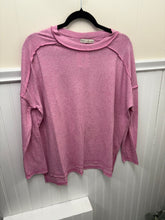 Load image into Gallery viewer, Pink t-shirt on a white surface