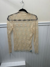 Load image into Gallery viewer, Beige lace top on a hanger against a white wall