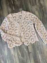 Load image into Gallery viewer, Beige lace cardigan on a wooden surface