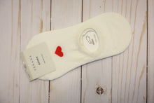Load image into Gallery viewer, White sock with a red heart design on a wooden surface
