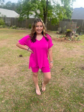 Load image into Gallery viewer, woman standing in a yard wearing a hot pink biker shorts set
